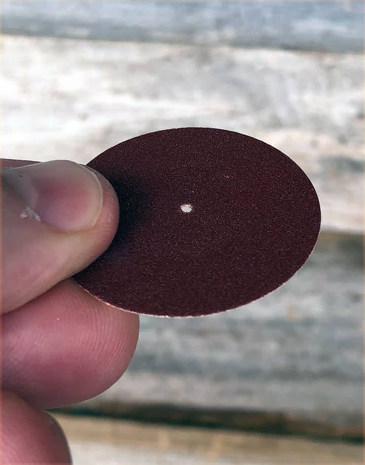 10.01101 = Aluminum Oxide Pinhole Sanding Disc Very Fine  (220grit) 1-1/2''  (Pkg of 100)