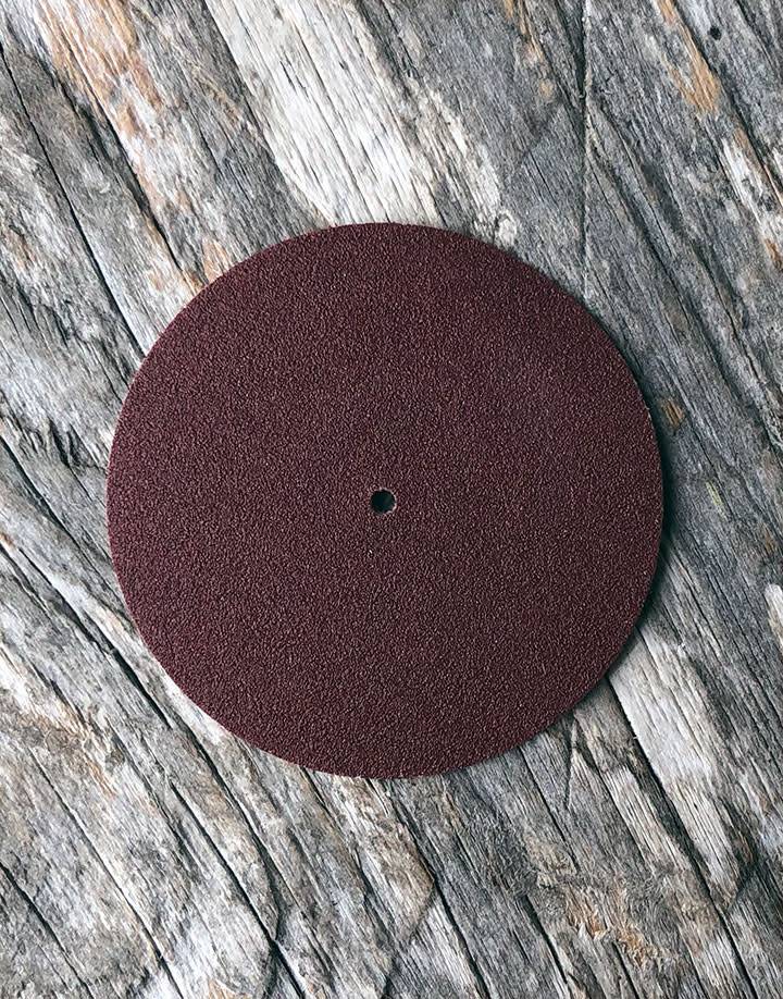 10.01101 = Aluminum Oxide Pinhole Sanding Disc Very Fine  (220grit) 1-1/2''  (Pkg of 100)