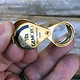 GemOro EL403 = 10X Triplet Loupe Gold Tone