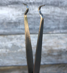 48.230 = TWEEZER RING HOLDING