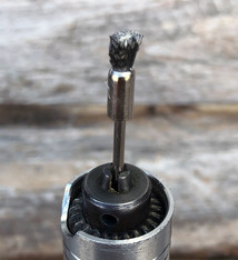 BU1455 = BRUSH END 1/4'' STEEL  CRIMPED MOUNTED  (12)