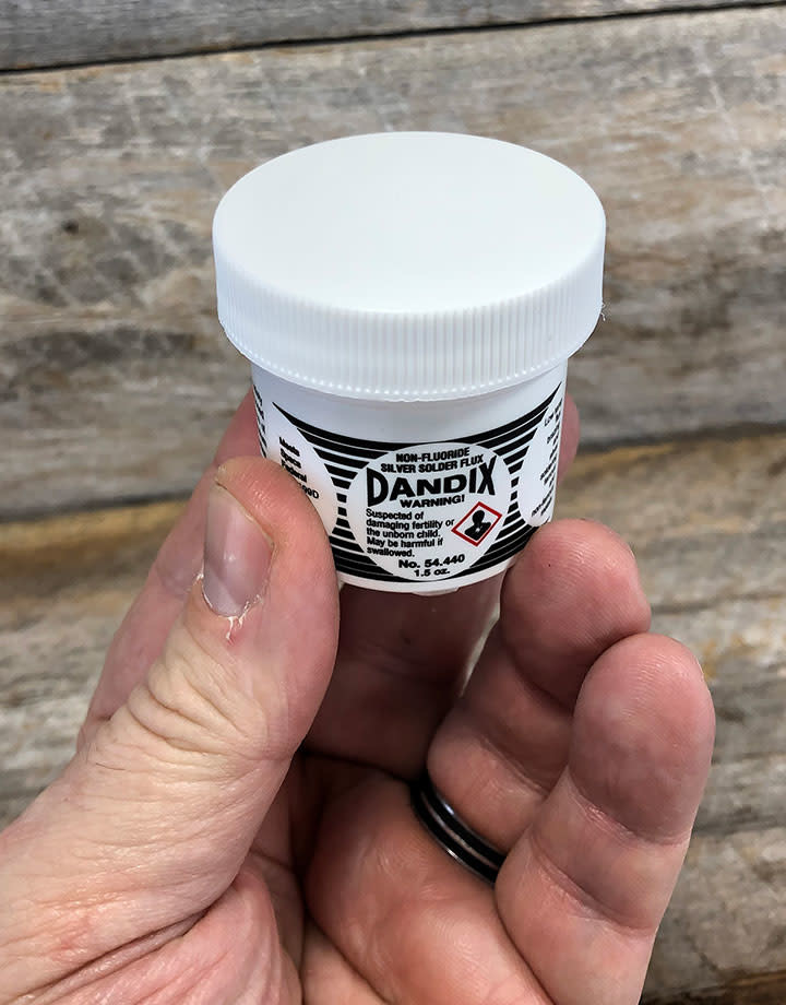 54.440 = Dandix Flux 1-1/2oz