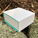 DBX4351 = Deluxe Magnetic Teal/White Combination Box 3-3/8'' x 3-3/8'' x 1-3/8'' (Each)