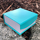 DBX4351 = Deluxe Magnetic Teal/White Combination Box 3-3/8'' x 3-3/8'' x 1-3/8'' (Each)