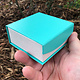 DBX4351 = Deluxe Magnetic Teal/White Combination Box 3-3/8'' x 3-3/8'' x 1-3/8'' (Each)