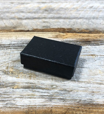 DBX2810B = BOXES - COTTON FILLED BLACK SWIRL  1-7/8'' x 1-1/4'' x 5/8''   CASE 100