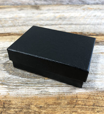 DBX2832B = BOXES - COTTON FILLED BLACK SWIRL  3-1/4'' x 2-1/4'' x 1''  CASE 100