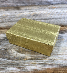 DBX2832G = BOXES - COTTON FILLED GOLD FOIL  3-1/4'' x 2-1/4'' x 1''  CASE 100