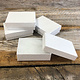 DBX2832W = BOXES - COTTON FILLED WHITE  3-1/4'' x 2-1/4'' x 1''  CASE 100