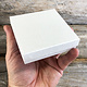 DBX2833W = BOXES - COTTON FILLED WHITE  3-1/2'' x 3-1/2'' x 1''  CASE 100