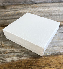DBX2833W = BOXES - COTTON FILLED WHITE  3-1/2'' x 3-1/2'' x 1''  CASE 100