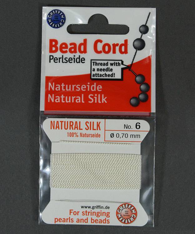 38.01206 = White Silk Beading Cord #6 on Card with Needle