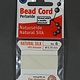 38.01206 = White Silk Beading Cord #6 on Card with Needle