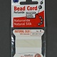 38.01204 = White Silk Beading Cord #4 on Card with Needle