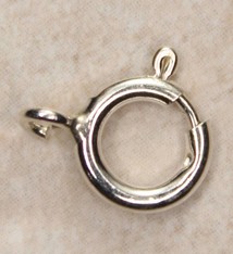 911S-05 = Sterling Silver Spring Ring 7mm Standard (Pkg of 10)