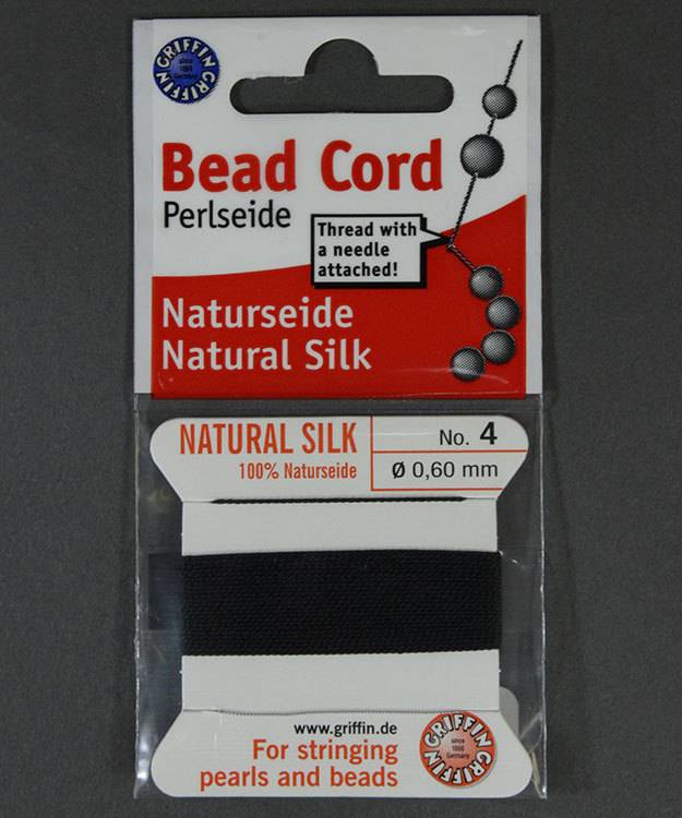 38.01214 = Black Silk Beading Cord #4 on Card with Needle