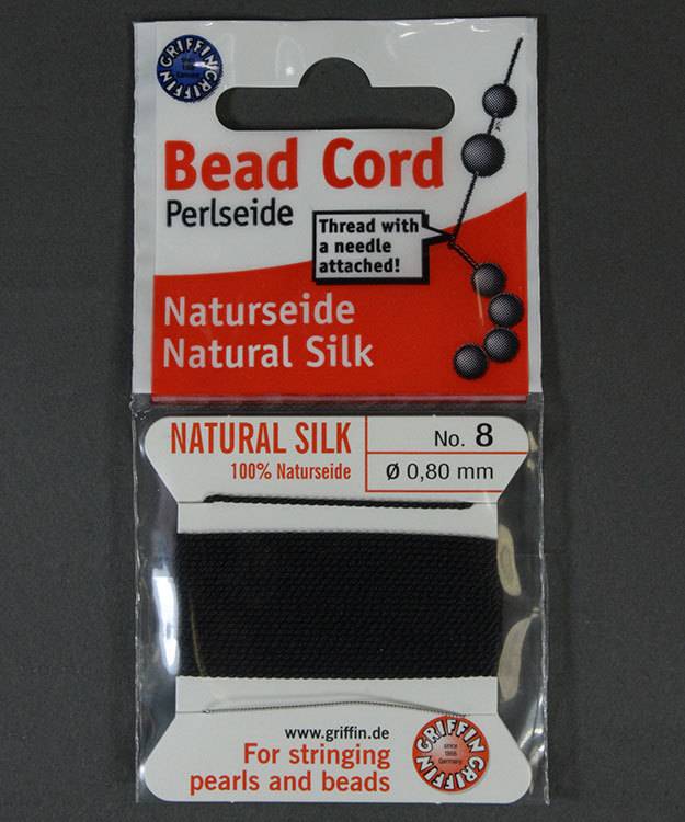 38.01218 = Black Silk Beading Cord #8 on Card with Needle