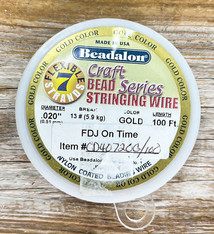 CD40720G-100 = Beadalon 7  .020"  Gold Color 100ft Spool