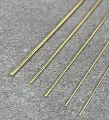 GW = 14K Yellow Gold Round Wire (sold by the inch)