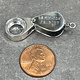 CM0012 = Eye Loupe Charm (moveable) Sterling Silver