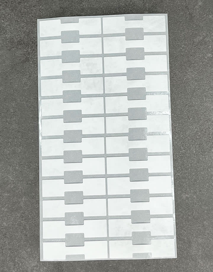 DTA7020 = White Tyvek Square Dumbbell Tags 1-9/16'' x 7/16'' (Pkg of 1000)