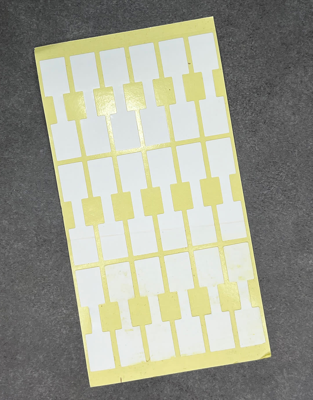 DTA7080 = White Square Dumbbell Tags 1-9/16'' x 7/16'' (Pkg of 1000)