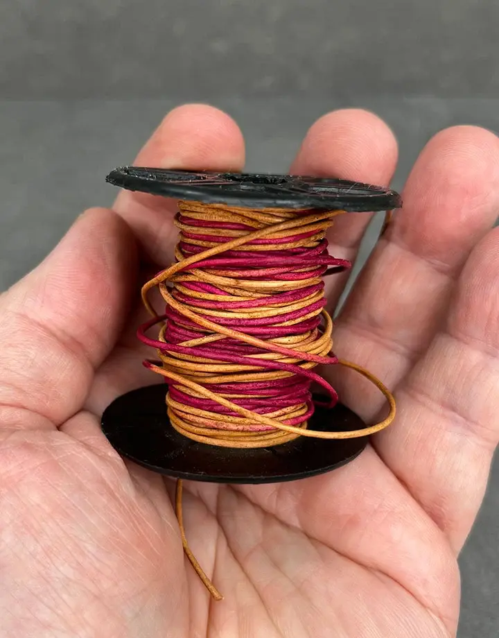 CD8504 = INDIAN LEATHER 1mm DYED Red/Yellow (41ft spool)