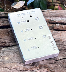 AN120 = Steel Riveting Block by Eugenia Chan