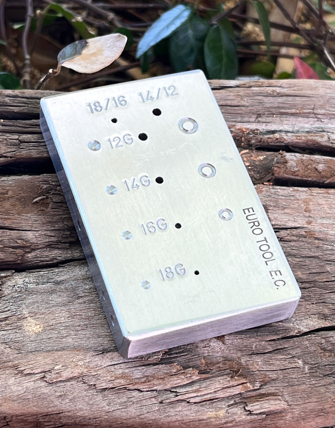 AN120 = Steel Riveting Block by Eugenia Chan