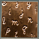 EM4016 = Sizzix Decotech Die - LOWERCASE HANDWRITING by Vintaj