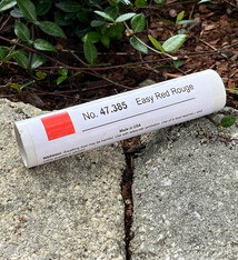 47.385 = Rouge Easy Clean-Up Red in a Push Up Tube