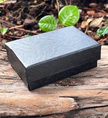 DBX2821B = BOXES - COTTON FILLED BLACK SWIRL  2-5/8'' x 1-1/2'' x 7/8''   CASE 100