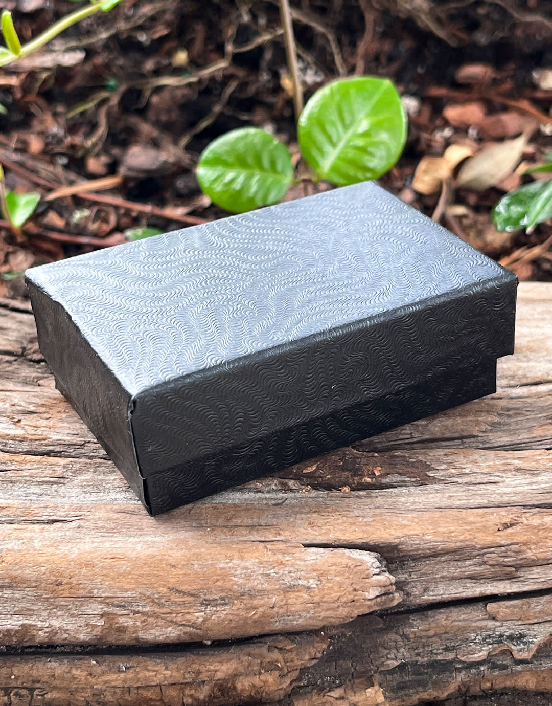 DBX2821B = BOXES - COTTON FILLED BLACK SWIRL  2-5/8'' x 1-1/2'' x 7/8''   CASE 100