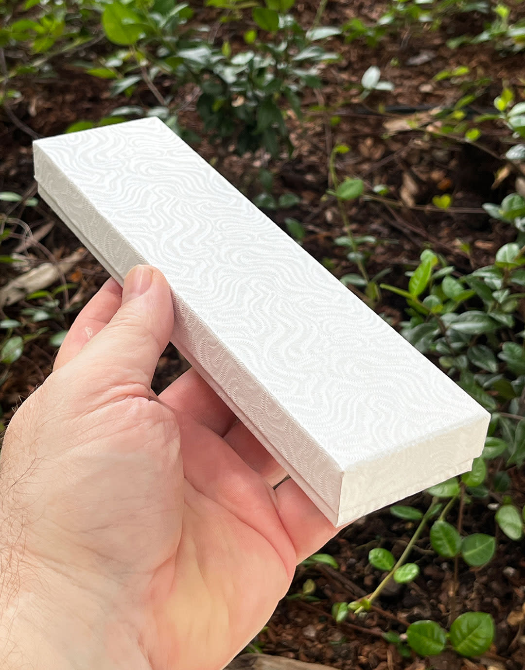 DBX2882W = Cotton Filled Box White Swirl  8'' x 2'' x 1''  (Case of 100)