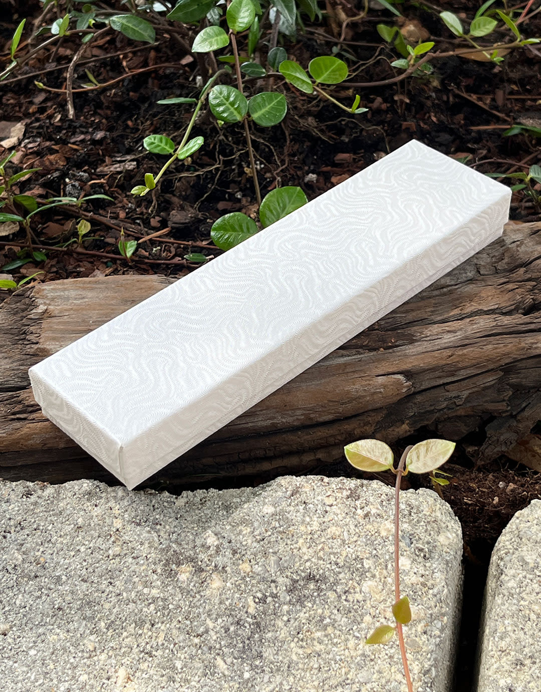 DBX2882W = Cotton Filled Box White Swirl  8'' x 2'' x 1''  (Case of 100)