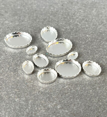 518S = Sterling Silver Oval Serrated Bezel Cup