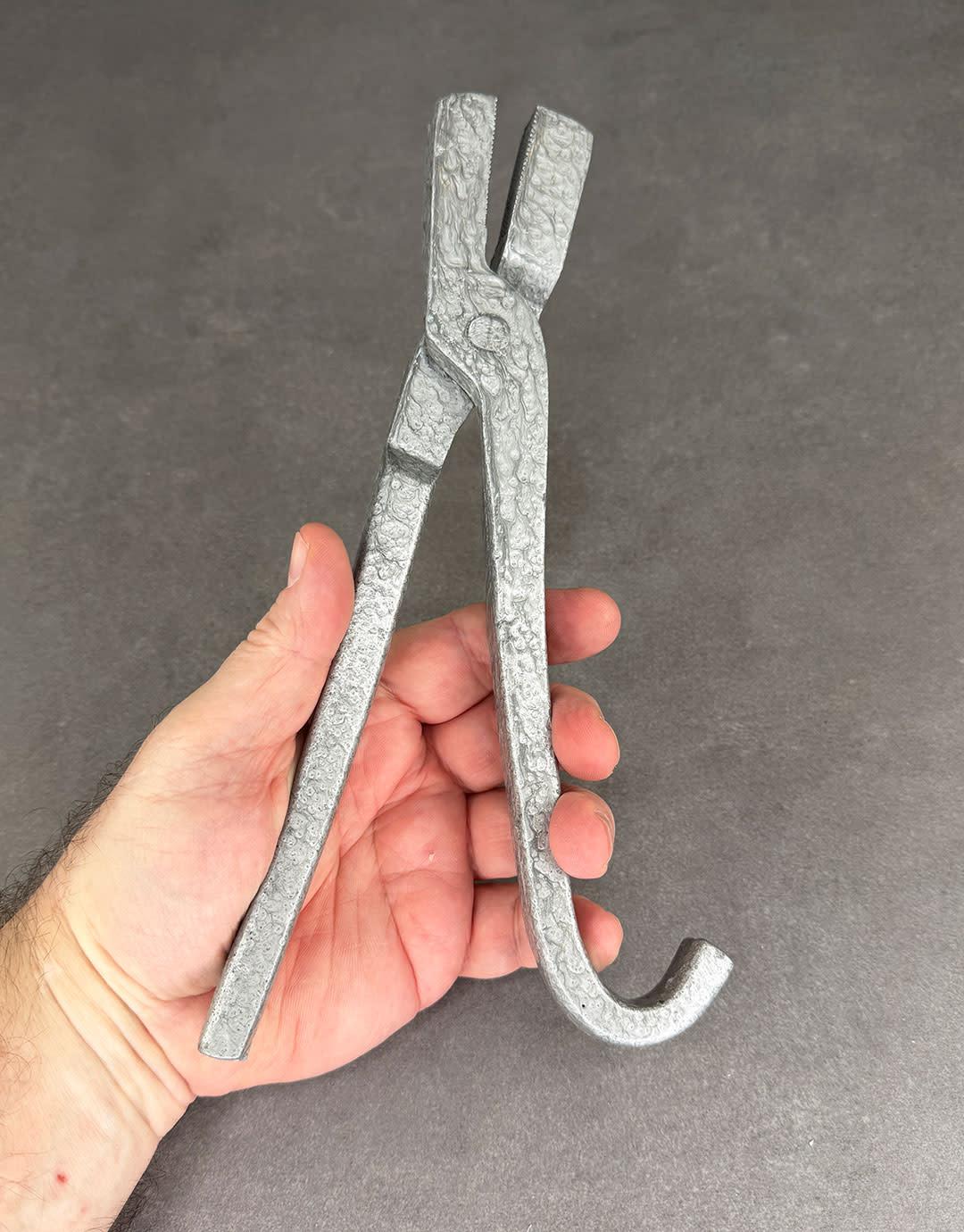 57.058 = Drawplate Draw Tongs 10''