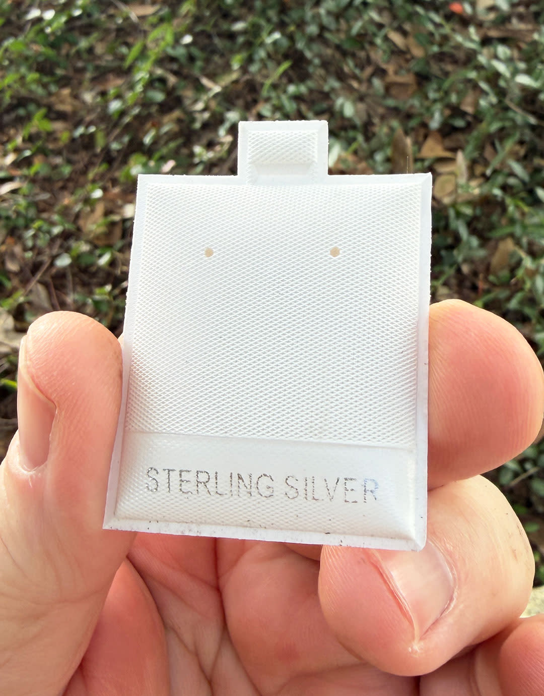 DER8023 = White Plastic Puff Pad 1-1/2''x1-3/4'' with Imprint ''Sterling'' (Pkg of 100)