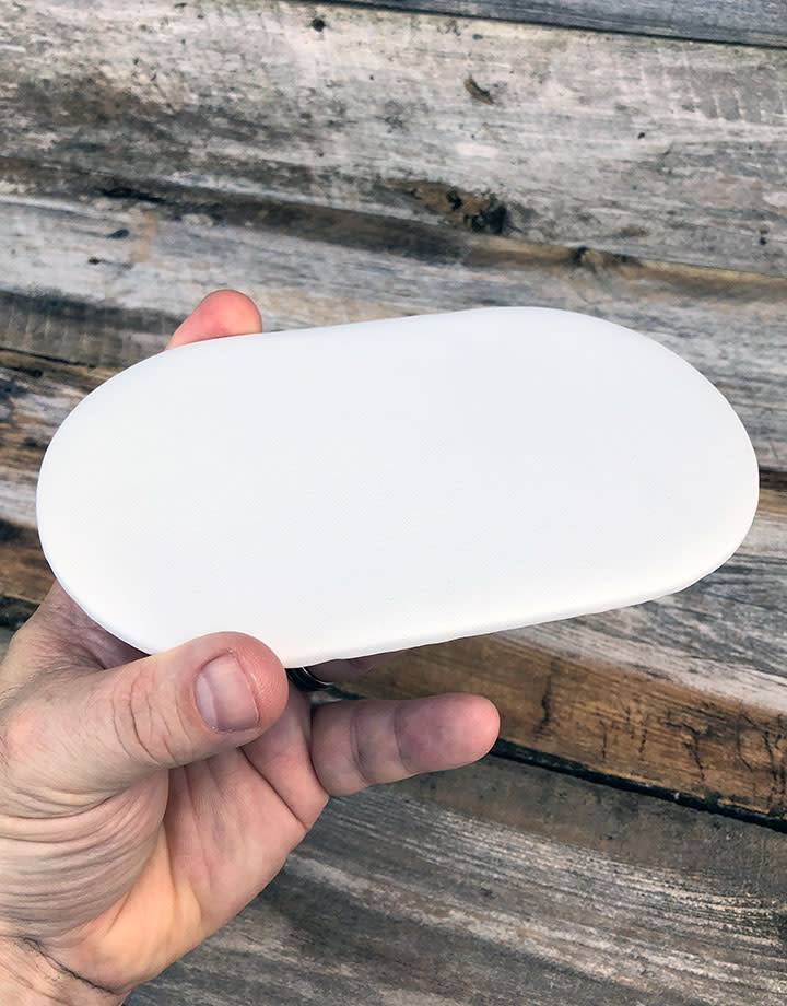 DIS6312 = White Leatherette Oval Display Pad 4'' x 7''