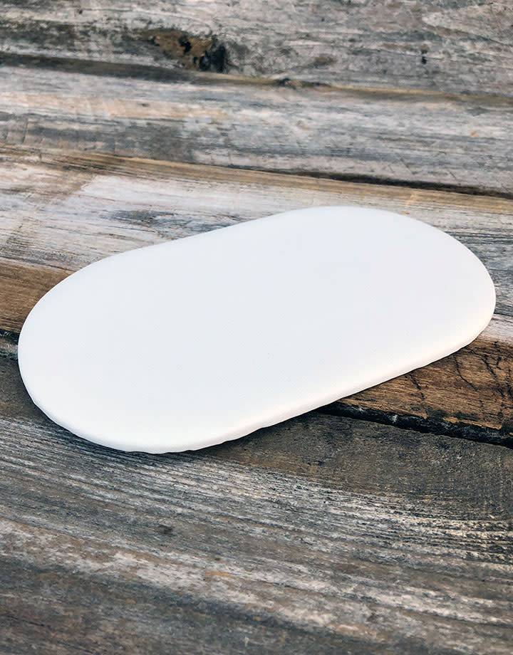 DIS6312 = White Leatherette Oval Display Pad 4'' x 7'' (Pkg/2)