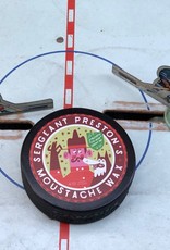 Sergeant Preston's Moustache Wax Hockey Puck