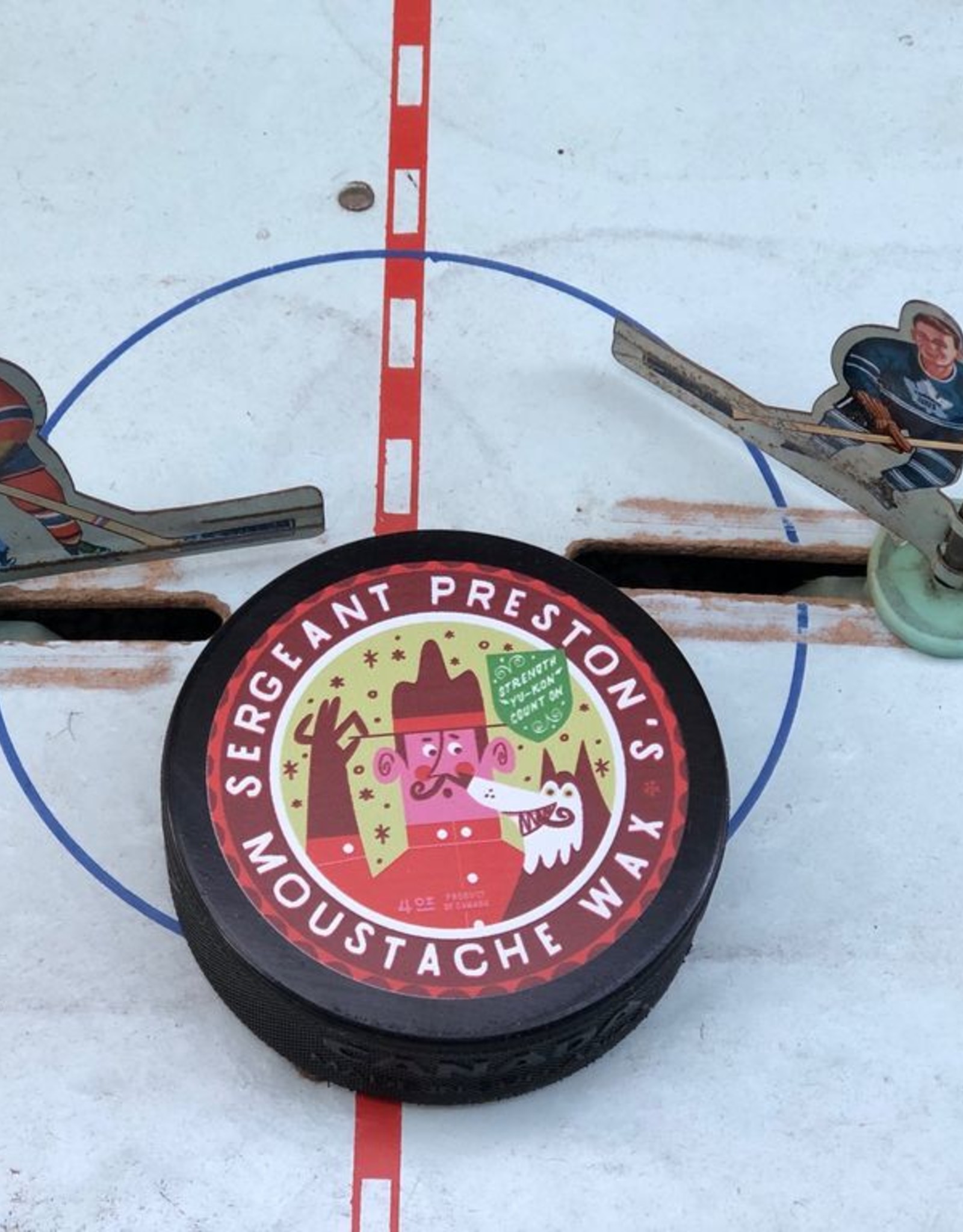 Sergeant Preston's Moustache Wax Hockey Puck