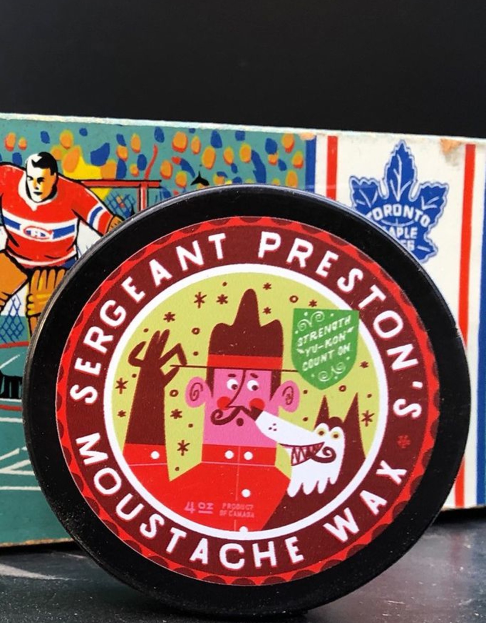 Sergeant Preston's Moustache Wax Hockey Puck