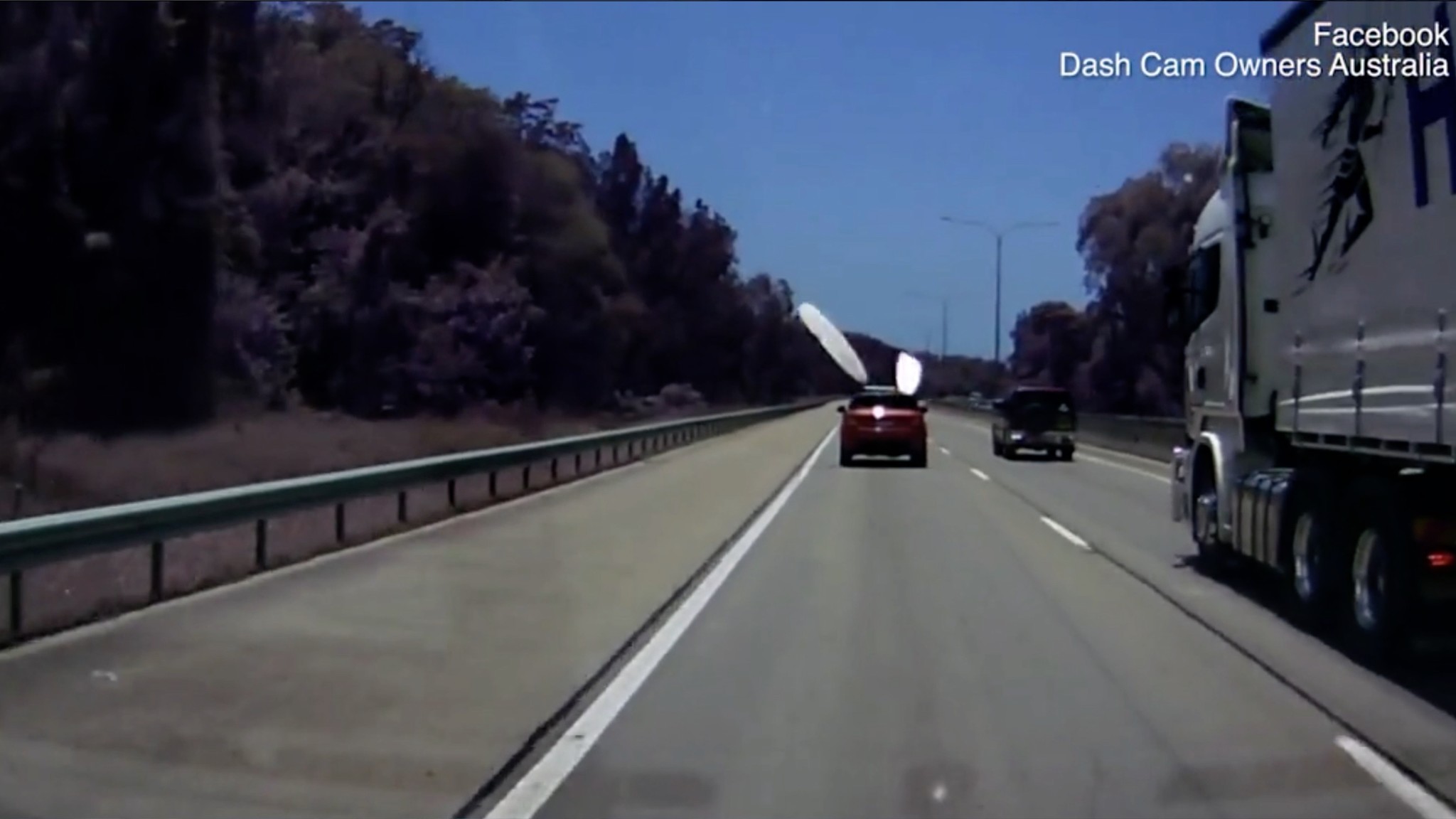 boards flying off car on highway