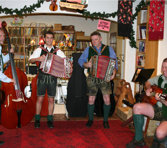 Visiting Czech musicians give an impromptu performance at Metzler's.