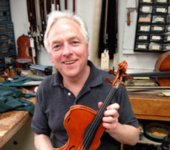 David Rivinus, innovator and maker of ergonomic asymmetrical violins and violas, at Metzler's on April 18, 2013.