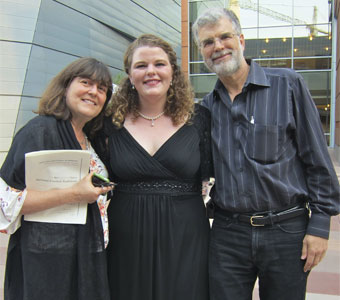 Julia Metzler with parents, after doing well singing at the Metropolitan Opera Regional Finals.