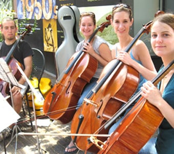 Leah Metzler (forground) with cello quartet at Aspen Music Festival.