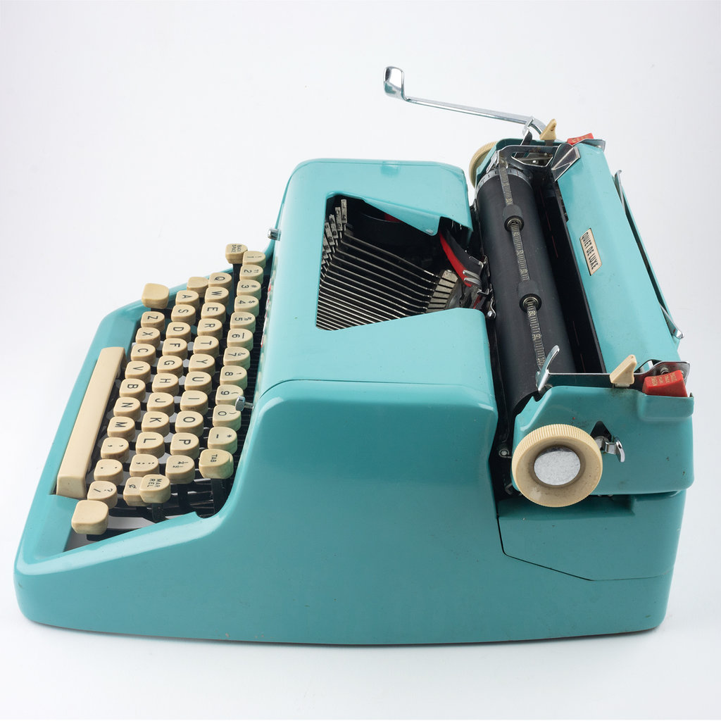 Royal Royal Quiet De Luxe Blue Typewriter