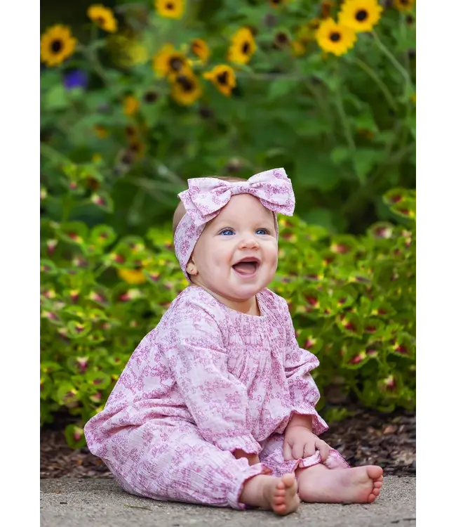Loretta Long Sleeve Floral Smocked Ruffle Leg Romper